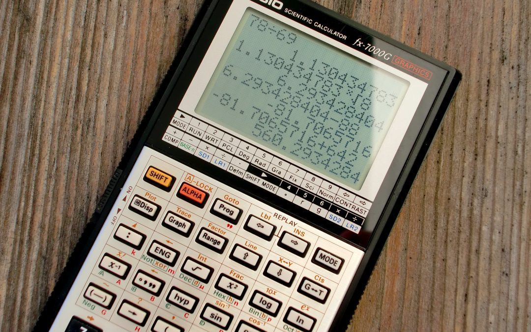 black-and-grey-casio-scientific-calculator-showing-formula-220301